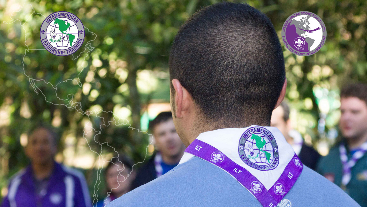 A participant wearing the purple ILT neckerchief at an Interamerican Leadership Training course
